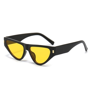 Fashion cat eye sunglasses with black frame and yellow lenses in a stylish triangle design