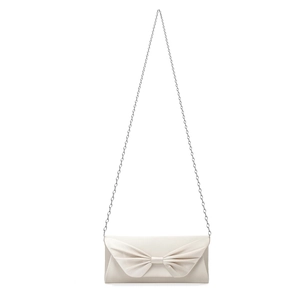 Close-up of champagne satin clutch with elegant bow fold and silver chain strap
