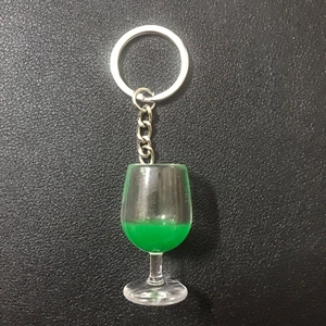 Creative resin goblet keychain with green liquid simulation and silver metal ring