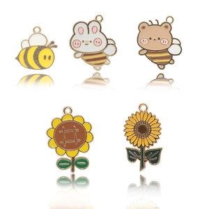 Detailed set of enamel bee, rabbit, bear, and sunflower charms for DIY jewelry making