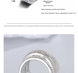 Detailed view of silver minimalist wavy ring showing sparkling cubic zirconia inlay and size