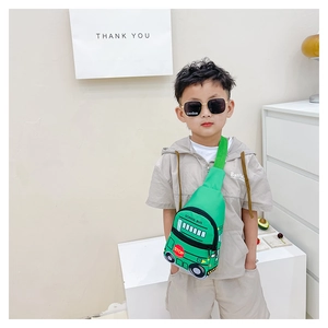 Detail of green school bus crossbody bag for kids with adjustable strap and cartoon car design