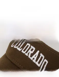 Detailed close-up of premium white Colorado embroidery on brown brushed cotton sun visor