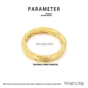Detail of twisted spiral rope bangle in 18K gold plated stainless steel, 63x10mm size