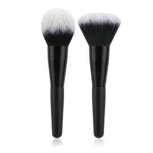 Set of black and white dual-tone flame-shaped makeup brushes for blush and powder