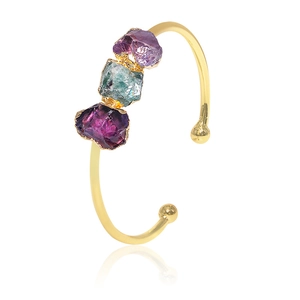 Adjustable gold-plated cuff featuring raw amethyst and teal natural crystal stones