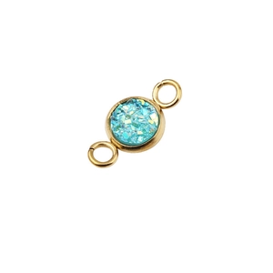 Macro detail of 6mm gold plated stainless steel connector with blue glitter inlay