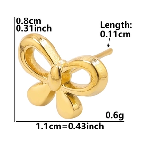 Detailed view of golden bow stud earring with dimensions showing 1.1cm width and 0.8cm height