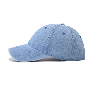 Classic washed denim baseball cap in light blue with vintage distressed finish and curved brim