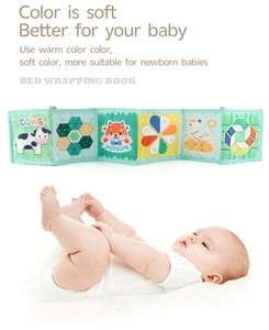 Detail of newborn bed wrapping book featuring colorful cartoon animals and geometric patterns