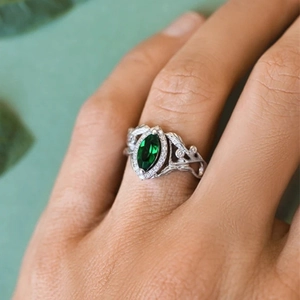 Elegant silver ring for women with marquise green zircon and nature leaf design