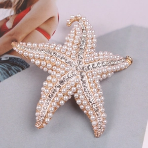 Elegant gold starfish brooch with white pearls and sparkling rhinestones for women