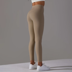 Detail view of high-waisted seamless yoga pants with moisture-wicking nude feel fabric