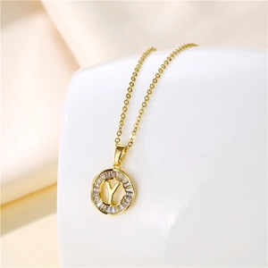 Detail of 18K gold stainless steel necklace with round letter Y zircon pendant