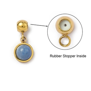 Detail of gold-plated blue stone charm featuring a functional internal rubber stopper
