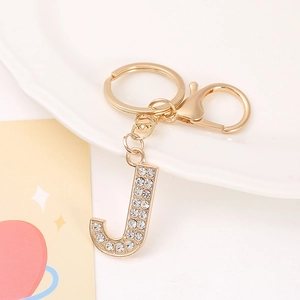 Close-up of golden letter J keychain with clear rhinestones and lobster clasp