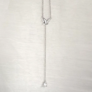 Close-up of S925 silver butterfly necklace with a dangling water drop zircon stone