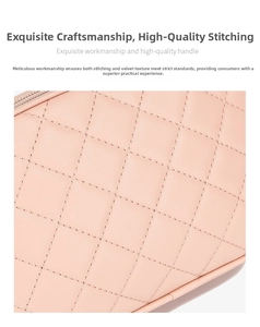 Close-up of pink quilted faux leather shoulder bag with detailed diamond stitching and zipper