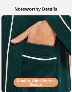Detail view of deep green plush bathrobe showing high quality fabric and double-side pockets