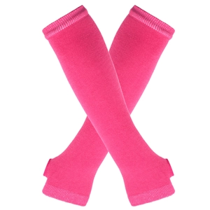 Detail view of rose red knitted arm warmers with thumb holes in a crossed layout