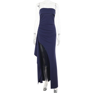 Detailed close-up of dark purple strapless knitted dress with high side slit detail