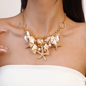 Golden double-layered necklace with starfish, conch shells and pearls for beach vacation