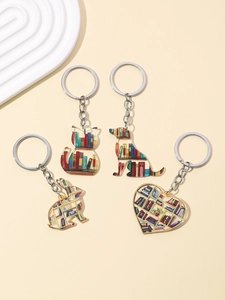 Detailed view of acrylic graduation keychains in cat, dog, rabbit, and heart shapes