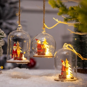 Set of 3 hanging Christmas glass lanterns with LED lights and wooden Santa figurines