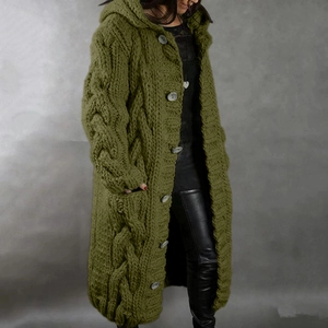 Detail of chunky olive green cable knit texture and textured buttons on a hooded cardigan
