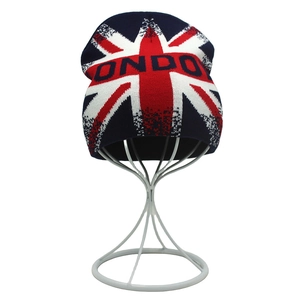 Detail of a London-themed knit beanie featuring the Union Jack flag and woven lettering
