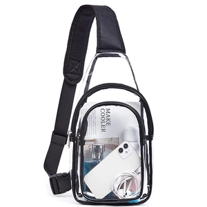 Clear PVC crossbody bag with black trim showing spacious interior storage on white background