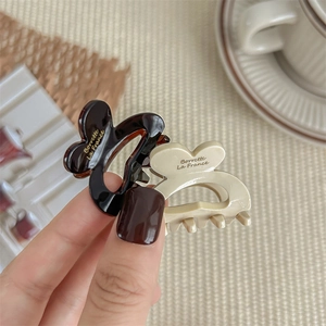Tortoiseshell and cream mini hair claw clips for half-up hair styles for women