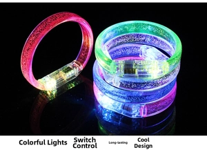 Detail showing the internal LED components and decorative bubbles in the glowing bracelet