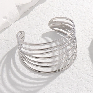 Minimalist silver stainless steel wide cuff bracelet featuring 7-layer geometric lines