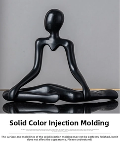 Detailed view of abstract black minimalist figure sculpture with matte finish for home decor