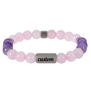 Detail of custom engraved stainless steel bar on pink and purple natural stone bead bracelet