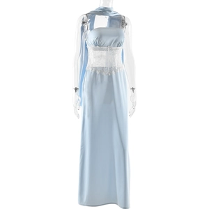Detail of light blue satin maxi dress featuring a sheer white lace corset waistband