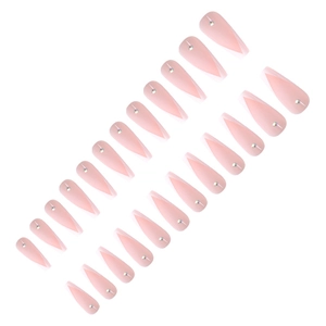 Detail of long almond French false nails in pink and white with rhinestone accents