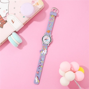 Detailed view of purple silicone watch strap with 3D unicorn and rainbow decorations