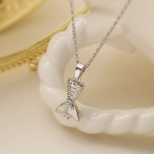 Elegant silver fish bone necklace with sparkling zircon accents on a minimalist chain