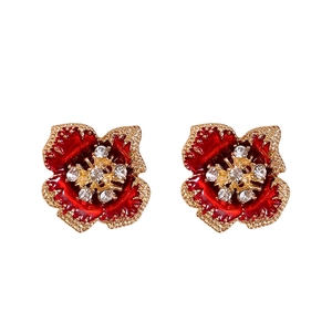 Vintage red enamel flower earrings with sparkling crystals and gold textured edges