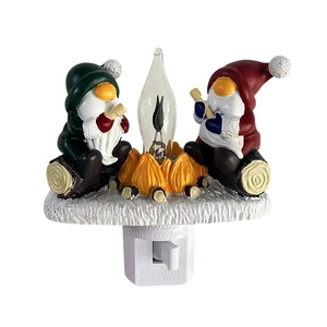 Christmas gnome night light with Santa hat and campfire for festive indoor holiday decoration