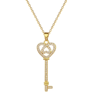 Elegant gold titanium heart key pendant necklace with sparkling pavé crystals on white background