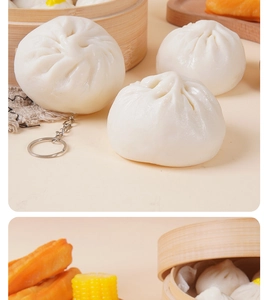 Detailed view of realistic Chinese baozi pendant with metal ring and food props