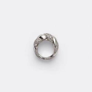 Detailed view of silver-tone twisted ring featuring micro-pave set sparkling cubic zirconia