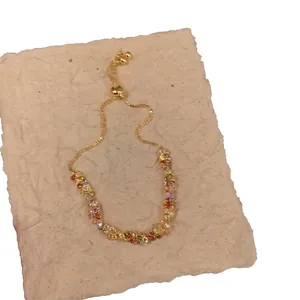 Elegant adjustable gold bracelet with colorful rainbow zircon stones and luxury finish