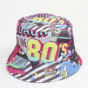 Detail of vibrant 80s 90s retro printed bucket hat with neon geometric patterns