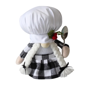 Christmas gnome chef plush doll with white hat and plaid apron holding a silver spoon