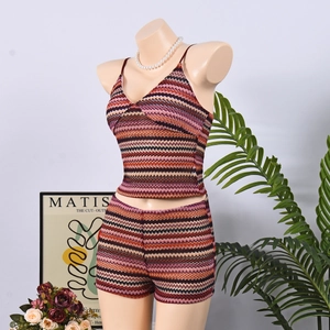 Detail of multi-color zigzag knit fabric on a cropped tank top and mini skirt set
