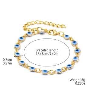 Bohemian evil eye charm bracelet with golden chain and adjustable lobster clasp closure